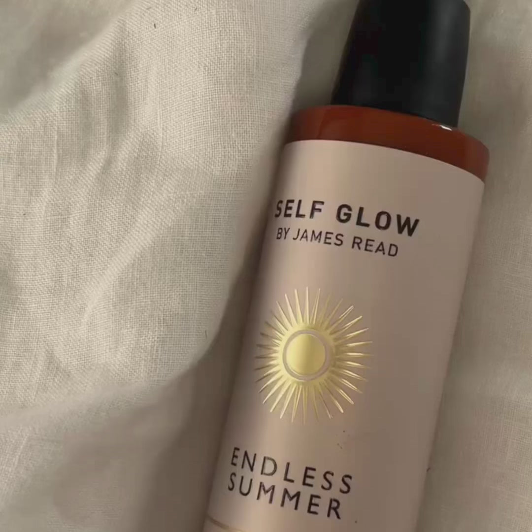 A video of a woman applying Self Glow by James Read Gradual Tan Moisturiser to her body and face revealing a beautiful golden glow and nourished skin after application